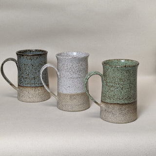 Practical Bee mugs: speckled tan clay, farmhouse-inspired glazes, microwave/dishwasher safe, 4.5" x 3". Handmade in Kingston, Ontario at Amaranth Stoneware.