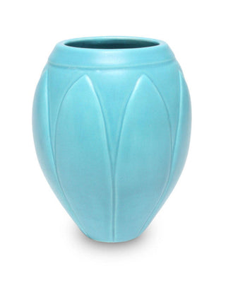 Satin Matte Light Blue glaze, an opaque, buttery robin's egg blue, enhances textured ware with a classic art deco look. Amaranth Stoneware Canada.