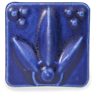 Satin Matte Dark Blue glaze, an opaque, buttery cobalt, enhances textured ware with a classic art deco look. Amaranth Stoneware Canada.