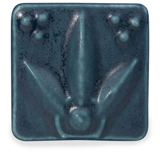 Satin Matte Blue Green glaze, an opaque, buttery deep teal, enhances textured ware with a classic art deco look. Amaranth Stoneware Canada.