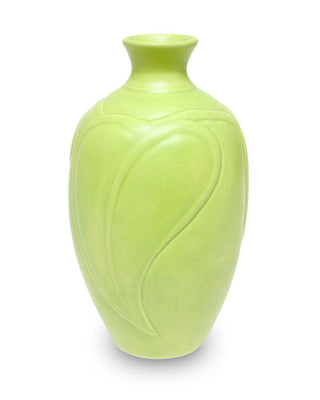 Satin Matte Mint glaze, an opaque, buttery light green, enhances textured ware with a classic art deco look. Amaranth Stoneware Canada.