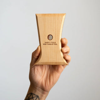 The Wine Tumbler Tool shapes perfect stemless wine glasses with two curved sides for red, white, or bubbles. 5” x 3.5”, made of maple wood. Handmade in St. Louis, MO. Amaranth Stoneware Canada.