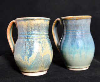 Andromeda glaze, deep blue-green with brown tones and gold crystals. Amaranth Stoneware Canada.