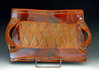 Autumn Spice glaze, satiny golden brown that shifts with cooling. Amaranth Stoneware Canada.
