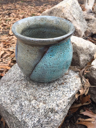 Birch glaze, mottled neutral color that creates oilspot effects when layered. Amaranth Stoneware Canada.