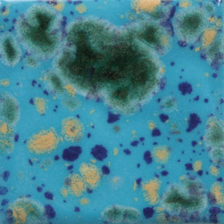 Cone 06: Opaque bright blue with green/yellow crystals; lightens at Cone 6 as crystals fade, enhancing mobility. Amaranth Stoneware Canada.