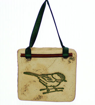 Handcrafted 4x4-inch stoneware Botanicals featuring seasonal plants and creatures. Finished with dogwood and ribbon. Weatherproof. Handcrafted in Kingston, Ontario at Amaranth Stoneware.