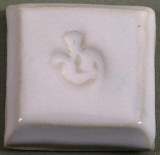 Bright White is a semi-opaque, glossy white glaze. Amaranth Stoneware Canada.