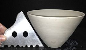 Wanda creates an 8 oz cocktail with 1 lb of clay, 3-1/2" tall by 3-3/4" wide. Also works as a bowl or planter rib. Amaranth Stoneware Canada.