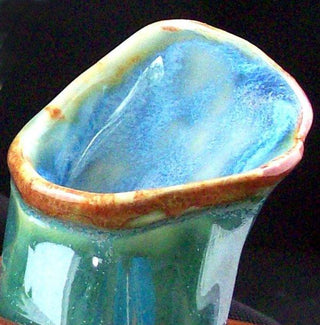 A brilliant pearlescent blue glaze that varies from translucent where thin to mottled where thick. It's possibly our runniest glaze. Amaranth Stoneware Canada.