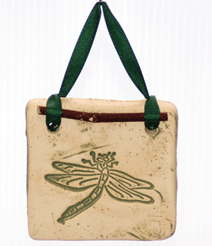 Handcrafted 4x4-inch stoneware Botanicals featuring seasonal plants and creatures. Finished with dogwood and ribbon. Weatherproof. Handcrafted in Kingston, Ontario at Amaranth Stoneware.