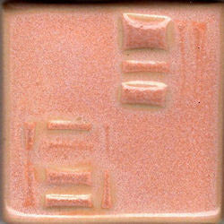 Enchanted Sunset glaze, transitioning from soft orange to mottled pink, features stunning microcrystals that create a captivating surface. Amaranth Stoneware Canada.