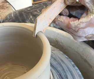 Foot Shaper: A sharp angle for cutting and a smooth concave edge for creating consistent feet. Handcrafted from beechwood, 8.5 inches. Amaranth Stoneware Canada.
