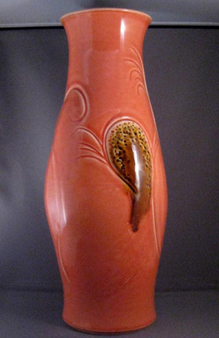Sedona Sunset Glaze on white stoneware. A bright, translucent glaze that adds warmth without hiding detail. Easy to apply and reliable. Amaranth Stoneware Canada.