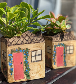 Handmade 4-inch House Planter, bringing a country cottage garden indoors. White stoneware with hand-painted details and drainage hole. Handcrafted in Kingston, Ontario at Amaranth Stoneware.