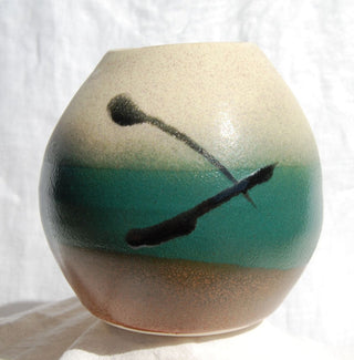 Piece by Joanna Turnbull. Creamy Matt (with Specks) glaze, a durable off-white with dark specks for added surface variation. Reliable and stable, perfect for all potters. Amaranth Stoneware Canada.