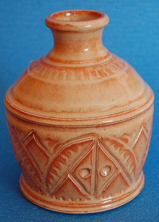The original cone 6 Shino! Rich brown that breaks darker over texture for a gas-fired look in any kiln. Amaranth Stoneware Canada.