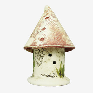 Handcrafted 7x4-inch Ladybug Castle with removable lid, perfect for creating a sanctuary for ladybugs in your garden. Weatherproof and handcrafted in Kingston, Ontario at Amaranth Stoneware.