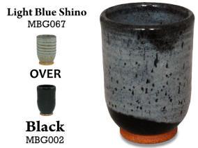 Light Blue Shino breaks to brown where thin, with pale blue in thicker areas. Great over texture. Amaranth Stoneware Canada.