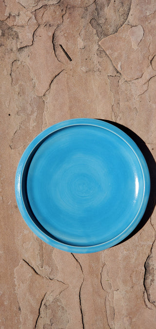 A glossy blue glaze with a stain-resistant finish that shines on white clays. Ideal for dishes, vases, and tiles. Amaranth Stoneware Canada.