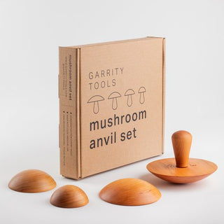 Garrity Mushroom Anvil Set includes 3", 4", 5", and 6" tops, one interchangeable handle, and eco-friendly packaging. Perfect for shaping clay slabs into dishes. Handmade in St. Louis, MO, with packaging made from 100% recycled materials. Amaranth Stoneware Canada.






