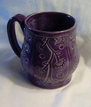 A deep, dark purple glaze that offers a solid, unbreaking finish, perfect for both decorative and practical uses. Amaranth Stoneware Canada.