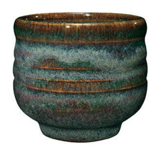 Iron Lustre is brown where thin with blue-gray floats where thick. Amaranth Stoneware Canada.