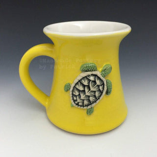 Buttercup glaze, bright cheerful yellow, ideal for accents and contrasts. Amaranth Stoneware Canada.