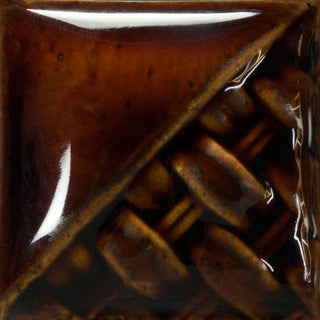Root Beer translucent rich brown gloss at Cone 6; one coat gives a hint of color, two to three coats deepen color while remaining translucent.
At Cone 10: Color darkens. Amaranth Stoneware Canada.