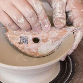 RV1 Rump Shaper Rib shapes bowls and plates with beveled edges, a sloping back, and a triangular edge for easy shaping. Red Oak. Amaranth Stoneware Canada.