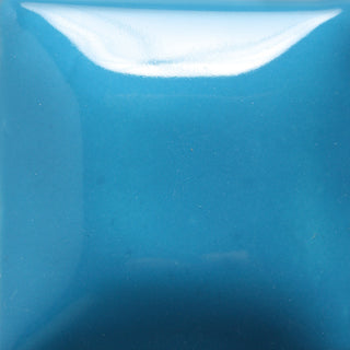Blue Yonder is a heavily pigmented, viscous Stroke & Coat® glaze. One coat gives a translucent finish; 2-3 coats for opacity and gloss at Cone 06.
At Cone 6: Semi-transparent, color slightly lightens. Amaranth Stoneware Canada.