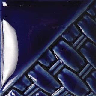 Sapphire rich cobalt blue glaze at Cone 6; glossy, mirrored surface with colors ranging from dark blue to bluish-purple depending on application thickness.
At Cone 10: No change. Amaranth Stoneware Canada.