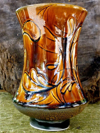 A translucent brown glaze that pools beautifully, varying from caramel to deep chestnut. Amaranth Stoneware Canada.