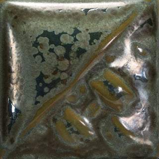 Cone 6: Speckled Toad is a shimmery green with dark grey specks that bloom, breaking to a semi-transparent olive green.
Cone 10: Color changes to olive green/metallic gray, breaking blue. Amaranth Stoneware Canada.