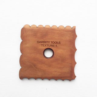 Texture 1 tool for creating small/medium waves or pointed curves with different patterns on your project. 3.25" x 3.25", made of maple wood. Handmade in St. Louis, MO. Amaranth Stoneware Canada.