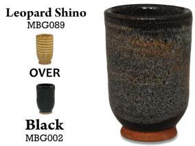 A lighter shino with orange-brown spots that breaks to brown over texture. Combines well with other glazes. Amaranth Stoneware Canada.