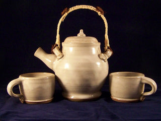 Eggshell glaze, a stable and glossy finish that offers a less bright alternative to white, ideal as a liner glaze for functional ware. Amaranth Stoneware Canada.